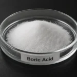 Boric Acid H₃BO₃, CAS 10043-35-3 white powder in a petri dish