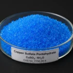 Copper Sulfate Pentahydrate 7758-99-8, CAS 7758-99-8 blue crystalline powder in a petri dish