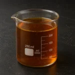 DDBSA Soft; Soft Dodecylbenzenesulfonic Acid; C₁₈H₃₀O₃S (linear). CAS 85536-14-7 brown liquid in a beaker