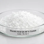Glycolic Acid GA 99 % Crystals; Glycolic Acid Anhydrous 99%; C₂H₄O₃, CAS 79-14-1 white crystals in a petri dish
